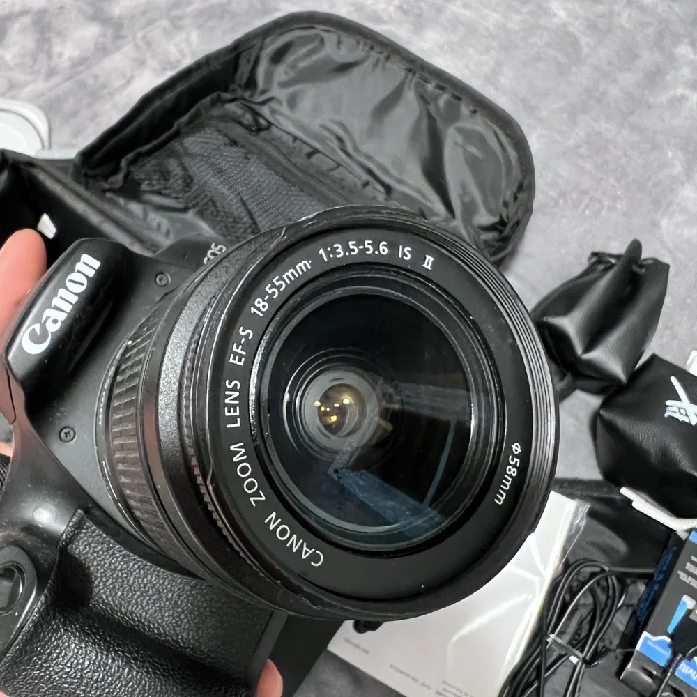 Canon Camera and a full kit with a bag and two additional lenses